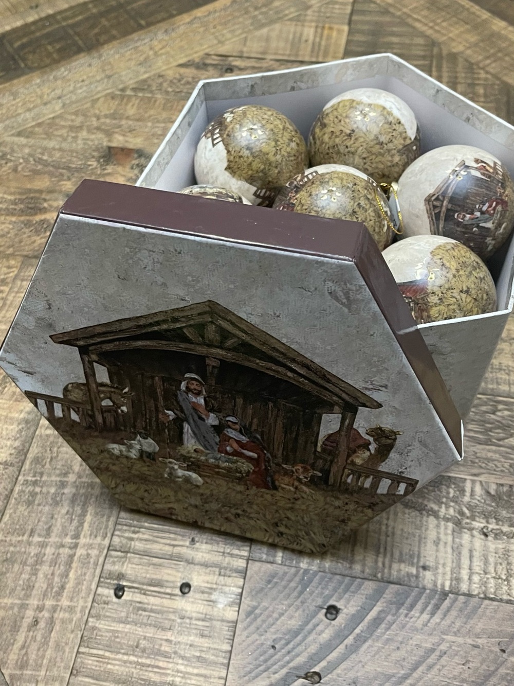 Burton decoupage ball ornaments with a matching textured hexagonal gift box.